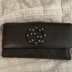Authentic Gucci Monogram leather wallet